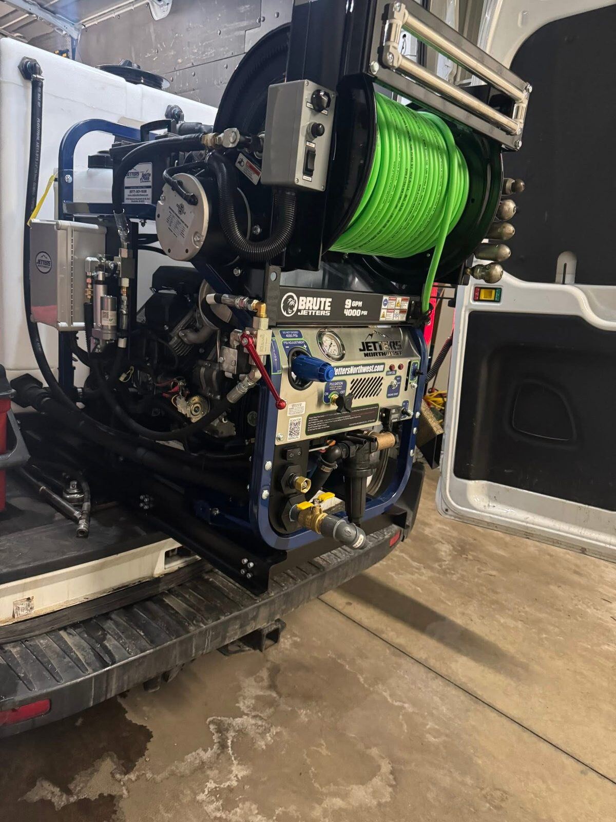 Van-mounted Brute 9 GPM hydro jetter Maki Sewer and Drain uses for residential and light commercial main lines in the Twin Cities