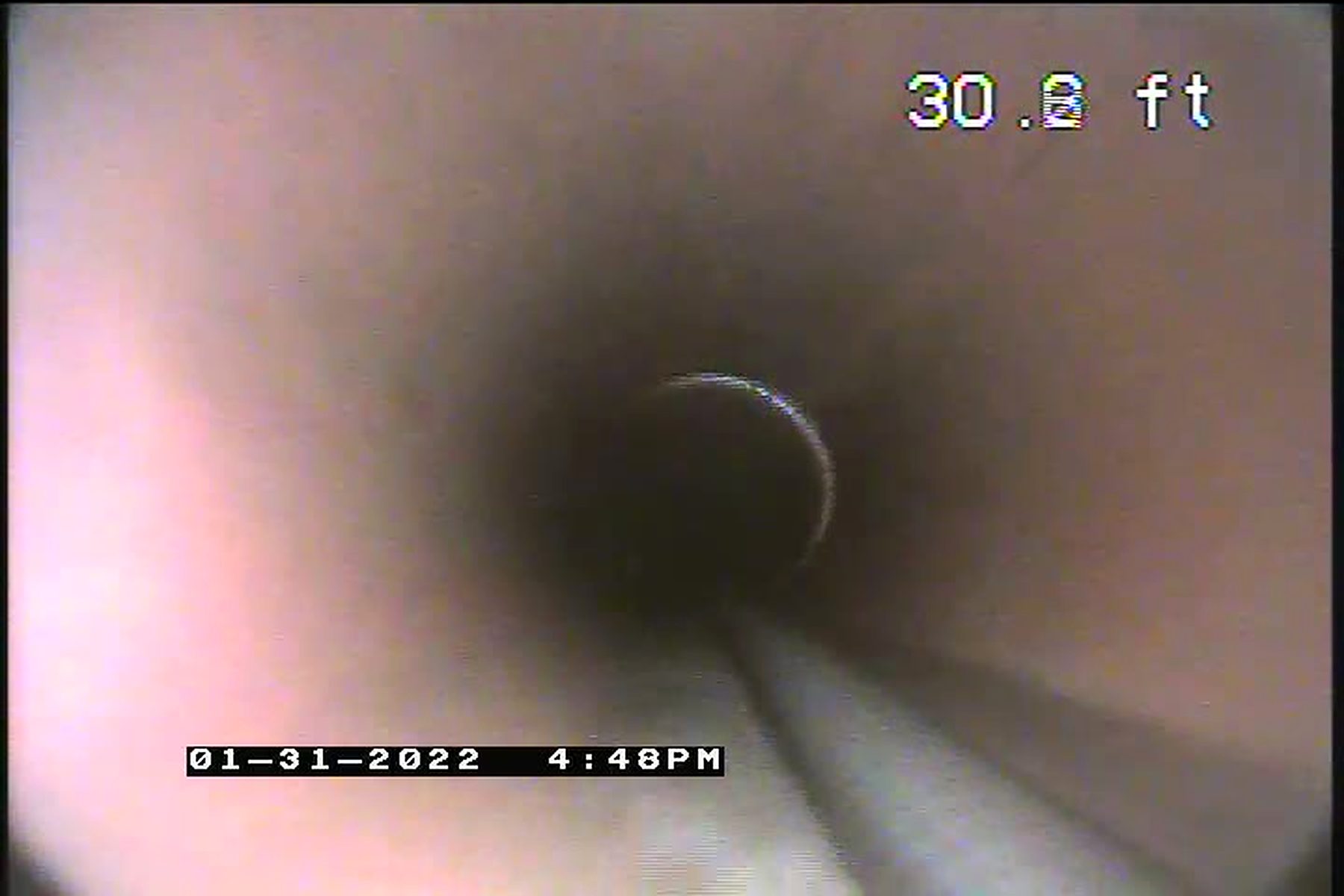Sewer camera view of a clean clay pipe joint during a Maki Sewer and Drain inspection in St. Paul